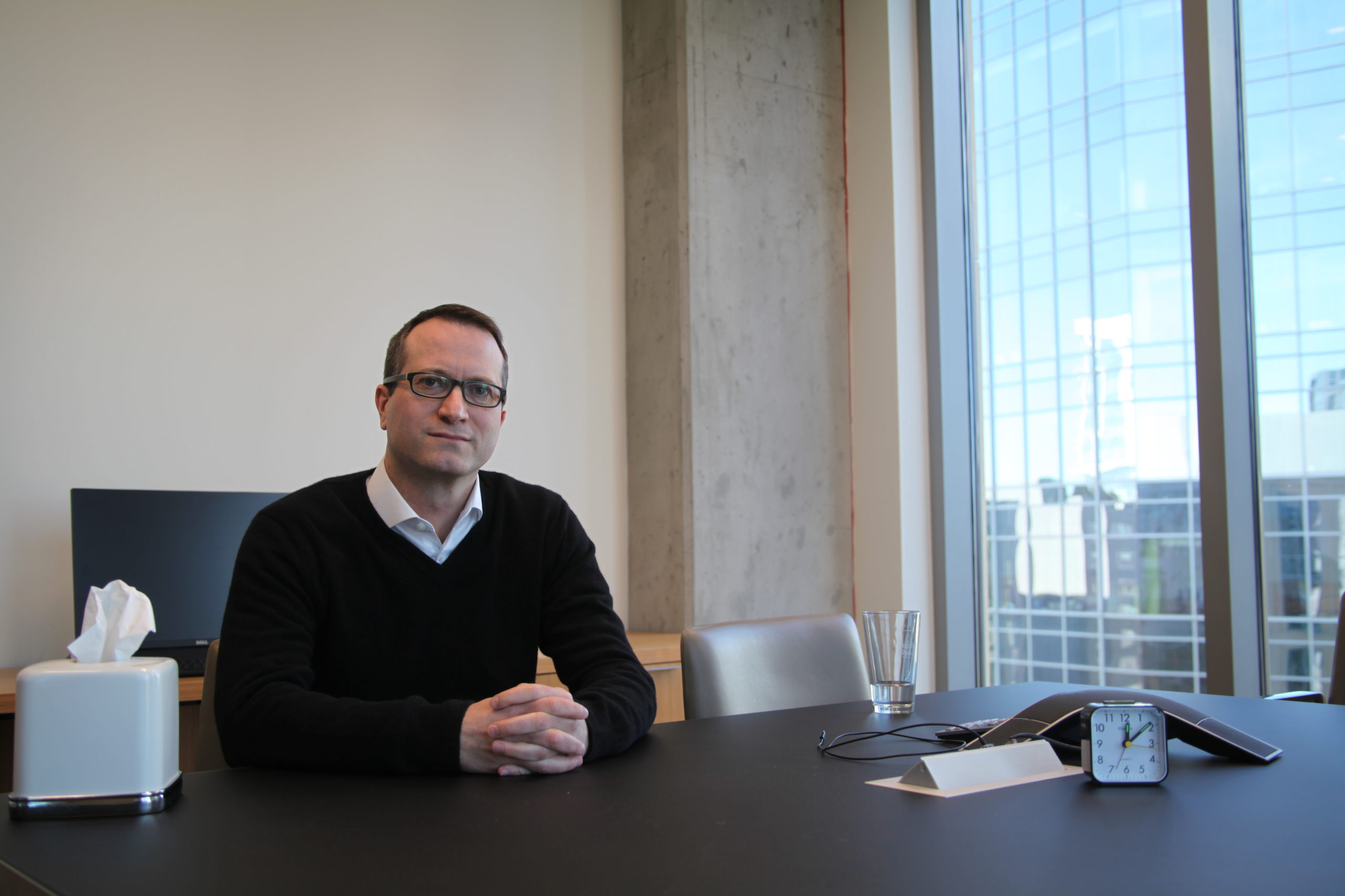 The Therapist Down the Hall A man looking intently at a desk