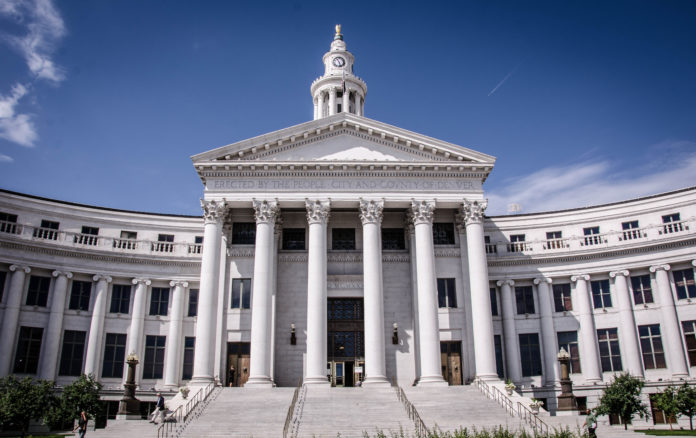 The Denver City County Building. It is curved with giant pillars over the entrance