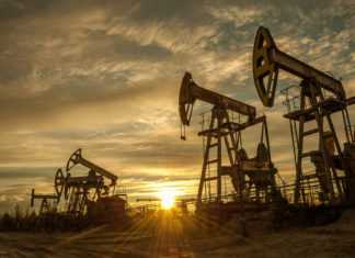 Court of Appeals Upholds Drilling Permit Grants Oil pump jacks at sunset sky background. Toned.