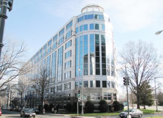 Haynes and Boone Secures ITC Patent Infringement Judgment A large building of glass that has a rounded top and is long
