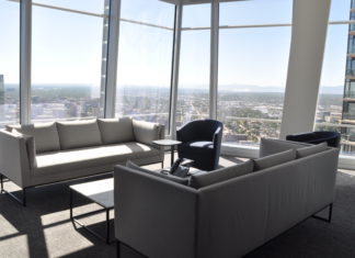 Local Lawyers Get Lofty Views: FAEGRE BAKER DANIELS A conference room with couches that look out over Denver