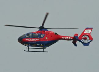 Colorado-Based Air Ambulance Operator Hit with Federal Lawsuit A red helicopter in the air