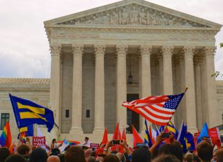 Supreme Court to Clarify Common Law Marriage for Same-Sex Couples large crowd of people in front of the united states supreme court waving American and equal rights flags