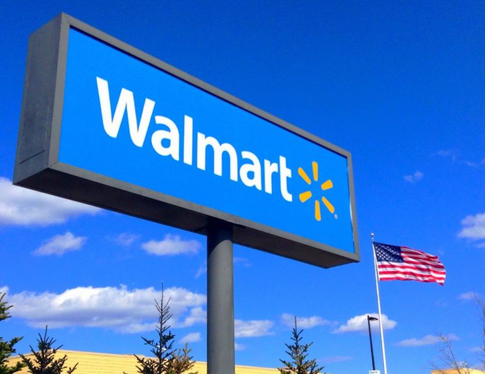 A large blue sign that reads Walmart in white bold letters