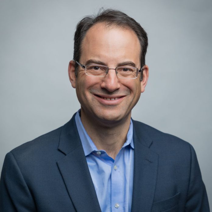 PHIL WEISER