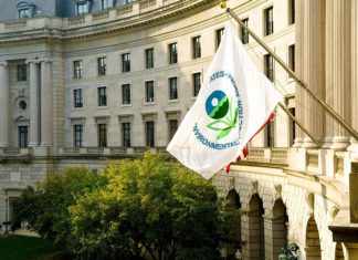 WOTUS Odyssey, Part 2: Obama and Trump Take Different Paths, Biden Makes Third Effort An EPA flag waves outside the EPA building.