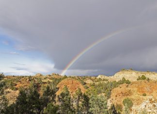 North Dakota Launches Lawsuit Aimed at Compelling More Public Land Fossil Fuel Leasing A rainbow over badlands in ND.