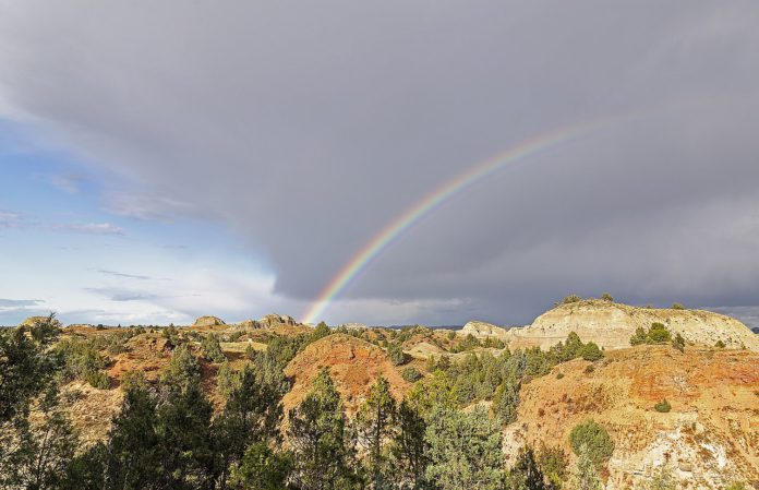 Rainbow over badlands, South Unit, Theodore Roosevelt National Park, near Medora, ND - courtesy Wikimedia, Creative Commons A rainbow over badlands in ND.