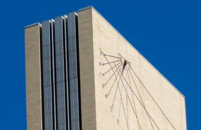 A sundial on the side of the Alfred A. Arraj U.S. Courthouse in Denver.