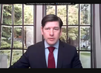 FCC Commissioner Simington Discusses the Future of Spectrum Sharing Screenshot of Nathan Simington speaking on Zoom