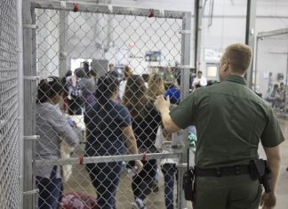 Want to Help in Pro Bono Immigration Cases? Immigrant Experts Offer Guidance in Upcoming CLE An immigration detention center officer holds a gate open for detainees