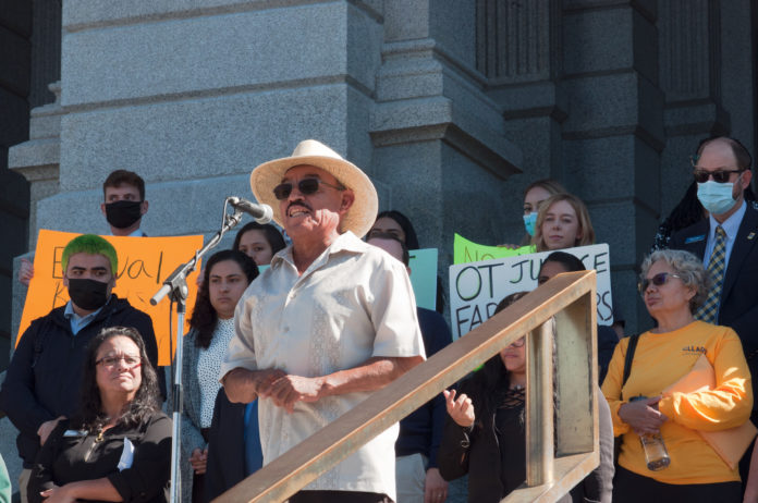 Adolfo Hernandez Atilano speaks to a crowd at the Colorado State Capitol