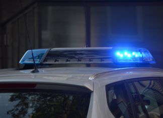 Jefferson County Sheriff’s Office Adopts New Plan to Effectively Communicate with Deaf and Hard-of-Hearing Individuals A parked police car flashes emergency lights in the dark.