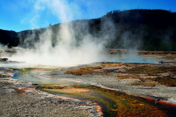 Geothermal pool in Yellowstone National Park Geothermal pool in Yellowstone National Park