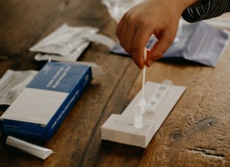 Employers Should Prepare for OSHA ETS, Though Court Battles Continue Covid test kit