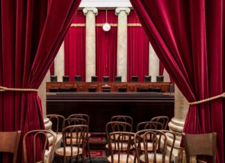 Biden’s SCOTUS Commision Releases Findings Interior of the U.S Supreme Court chambers