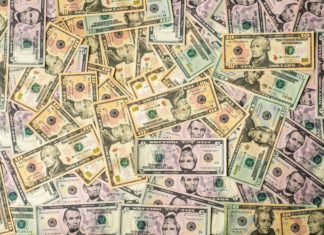 Survey Shows Growth in Corporate Counsel Pay, but ‘Ceiling Remains Hard to Reach’ U.S. banknotes