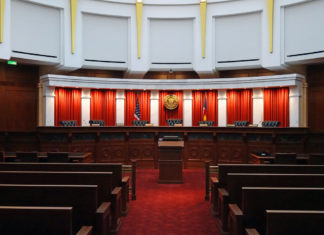 Justices Appear Skeptical About Hospital Contract Requiring Patient to Pay Six-Figure ‘Sticker Price’ Colorado Supreme Court courtroom