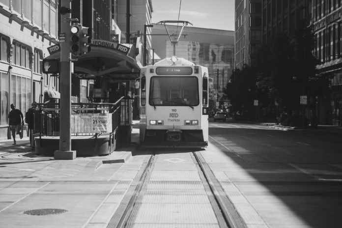 a Denver lightrail train picks up passengers at the California Street stop