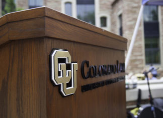 11th Annual John Paul Stevens Lecture Spotlights Tribal Justice Systems A brown podium with a University of Colorado logo on it and text reading Colorado Law.