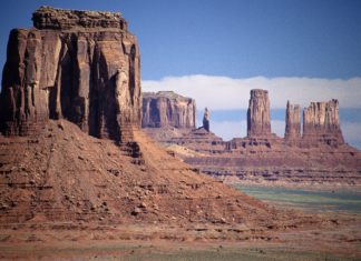DU’s Tribal Wills Project Helps Students and Clients Navigate Complexities of Federal Indian Law and Estates A landscape in the American southwest of a large, orange rock formation with other rock formations in the background.