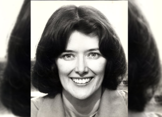 Remembering Pat Schroeder: Pioneer, Trailblazer in a black and white photo, Pat Schroeder is smiling widely. She’s got short, dark hair and it looks like she may be wearing a tan or light-colored blazer.