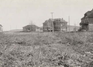 ‘Female Furies,’ a Brief History of Juvenile Detention Facilities Four historical buildings are scattered across an open-looking plain.