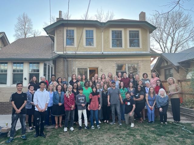 Colorado’s women judges are gathered for a group photo in front of a house.