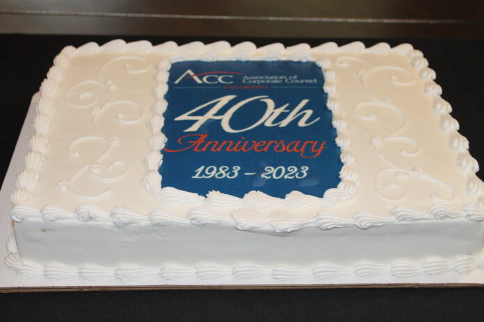 a white sheet cake has the ACC Colorado logo and says 40th Anniversary 1983-2023