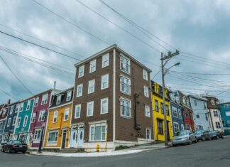 Real Estate Attorneys Weigh in on Affordable Housing Multi-colored high-rise buildings.