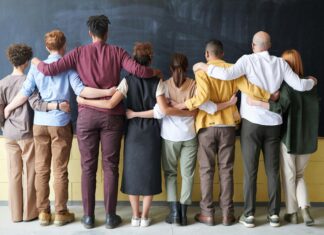 Diversity on the Bench Coalition 2024: Recruit, Retain and Support a More Representative Judicial System A group of people standing indoors.