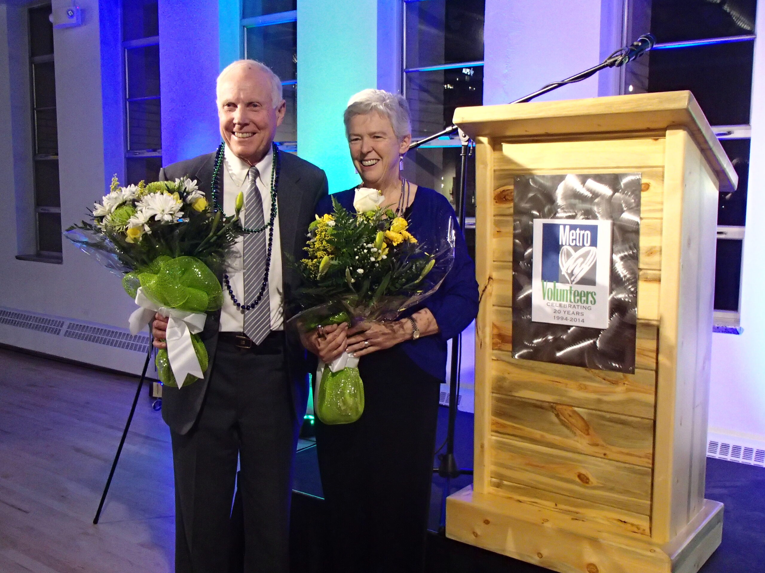 Photo of Sam and Jean Guyton accepting humanitarian award.  