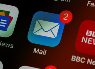 CBA Issues New Ethics Opinion for Lawyers Addressing Clients in Group Emails, Texts the mail icon on an iPhone shows two new messages