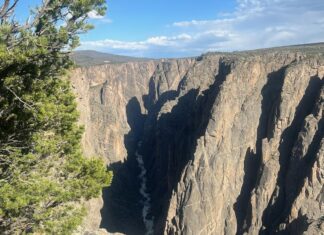 Native American Leaders Want to See Protection of Their Senior Water Rights An elevated view of the Gunnison River carving its path through the cliffs of the Black Canyon of the Gunnison National Park.