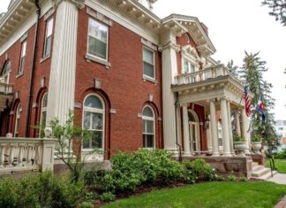 District Court Hears Suit Arguing that Colorado Campaign Contribution Limits are Unconstitutional The front of Boettcher Mansion, the residence of the Colorado Governor, from a side angle. The exterior is of red brick, with several windows and columns in site.