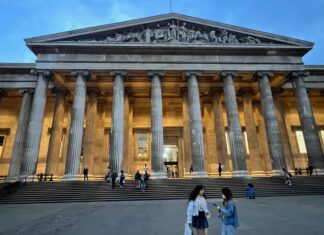 Art Law, a Unique Practice at the Intersection of Law and Creativity The front entrance to the British Museum, with a colonnade backlit by lights and a stone sculpture at the top of the colonnade.
