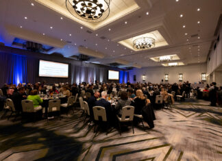 The Immense Responsibility, Courage Required of Colorado’s Judges: CJI’s 2024 Judicial Excellence Awards Gala Gala dinner attendees sit at tables in a large ballroom at the Sheraton Downtown